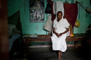 Basanti Dasi, 70, sits in her quarters at the Radha Kunj ashram (photo by David Shaw)